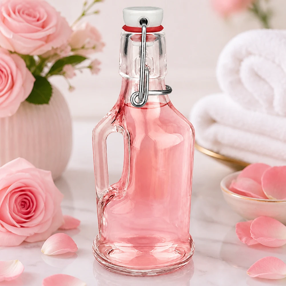 200 ml glazen fles Bertha en PVC-sluiting UNiTWIST® 200 ml glazen fles Bertha roze getint in romantische decoratie met rozen en bloemblaadjes, UNiTWIST dop