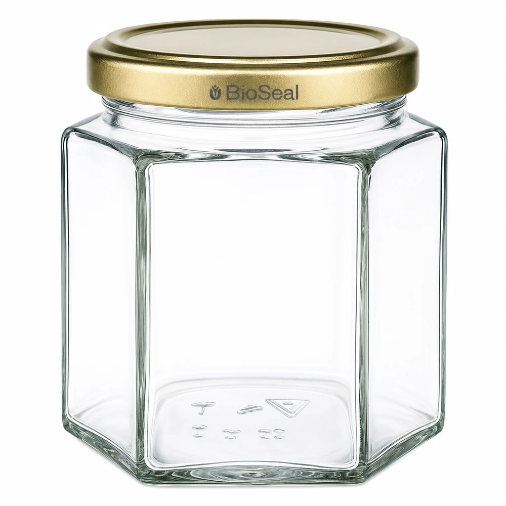 Honingpot 520 g met gouden BioSeal UNiTWIST-deksel Honingpot 520g zeshoekig transparant met gouden BioSeal deksel voor imkers en honing bottelen