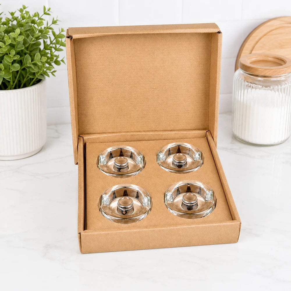 Fermentatieglasgewichten met verzonken greep, set van 4 UNiTWIST fermentatie pot gewichten set van 4 geopend in bruine doos naast plant en voorraad pot