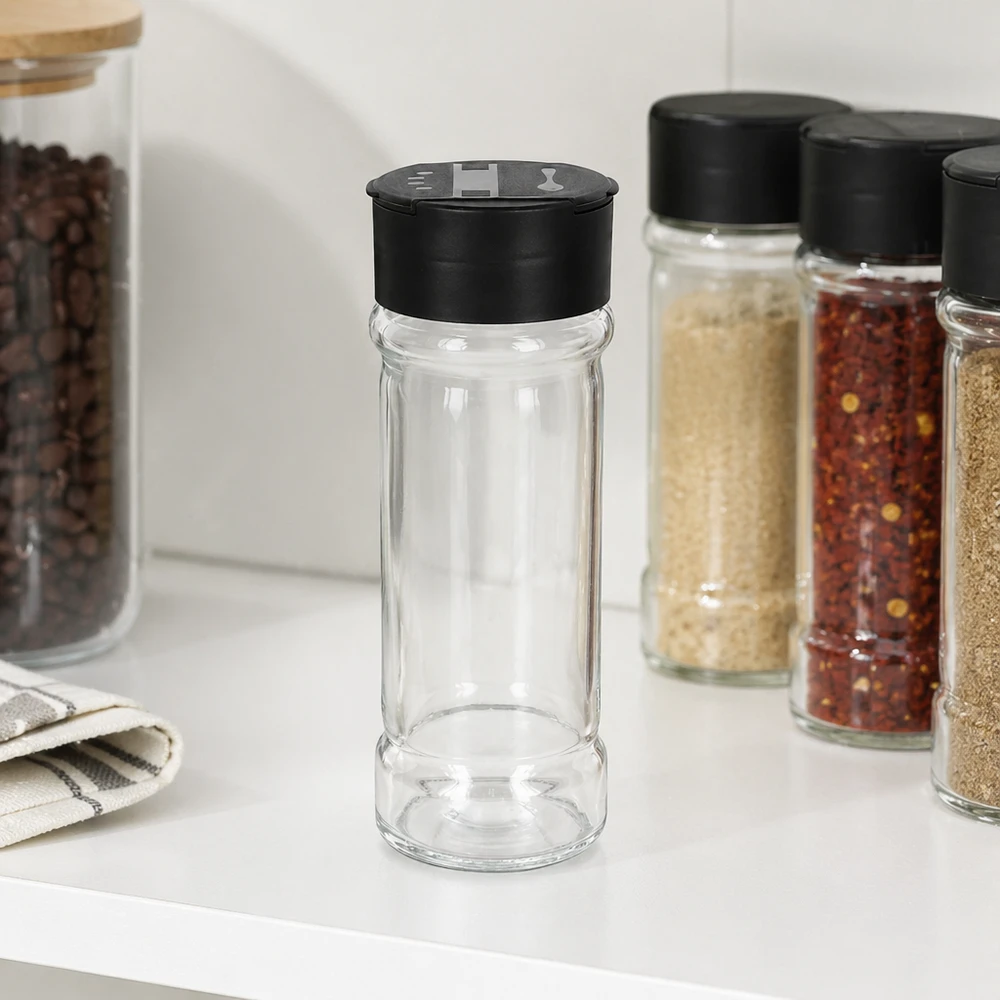 Zout-/kruidenpotje 100 ml met dubbele strooier, zwart Leeg kruidenpotje van 100 ml met dubbele strooier, zwart, tussen gevulde kruidenpotjes